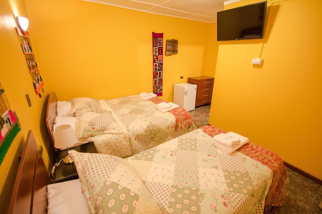 Hostal Kirckir Сан-Педро-де-Атакама Номер фото